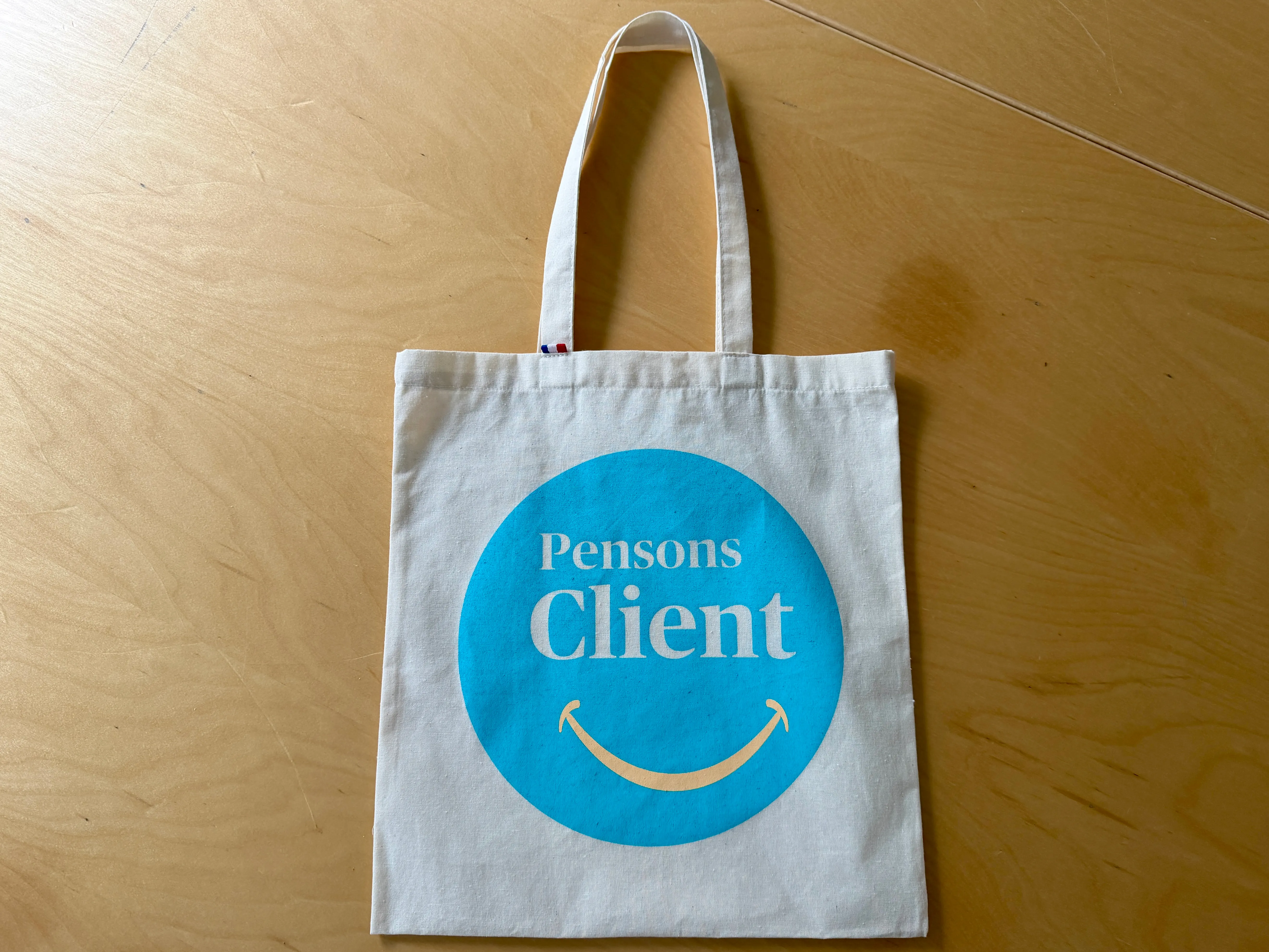 Tote bag en coton tissé et marqué en France, projet AXA France 2026 — réalisation PUBLI MENI